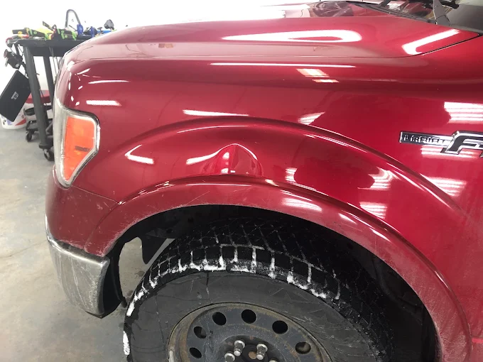 Ford F-150 Lariat with dent damage before paintless dent repair in Hamilton